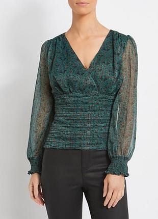 Зеленая блузка с легким блеском