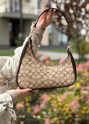 Жіноча сумка coach, невелика, можна одягати через плече