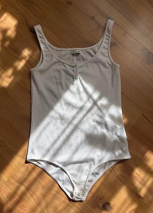 Білий жіночий бодік