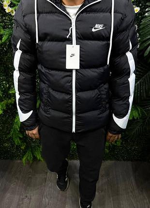 Пуховик nike чорний з білими вставками
