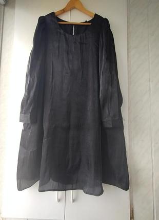 Цікаве плаття а-силуету із широкими рукавами