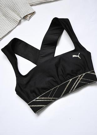 Красивый черный топ с золотистыми элементами puma