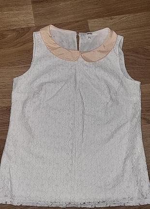 Нежная элегантная блуза без рукавов