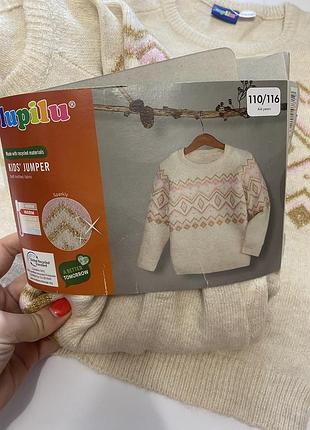 Вязаний светр на дівчинку 110-116