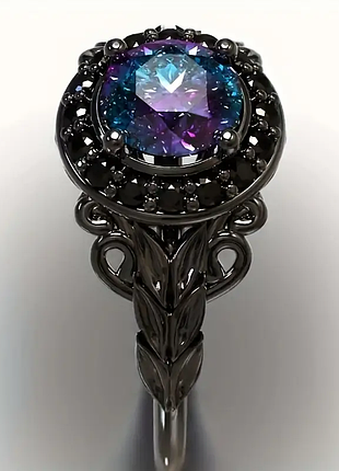 Кольцо готическом стиле с радужным камнем