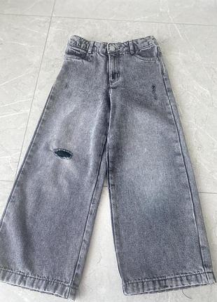 Джинси з потертостями