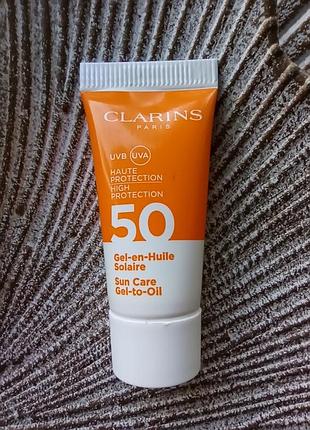 🌅clarins sun care gel-to-oil spf 50 солнцезащитный гель для тела миниатюра 8мл.