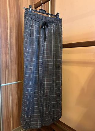 Штани палаццо у клітинку