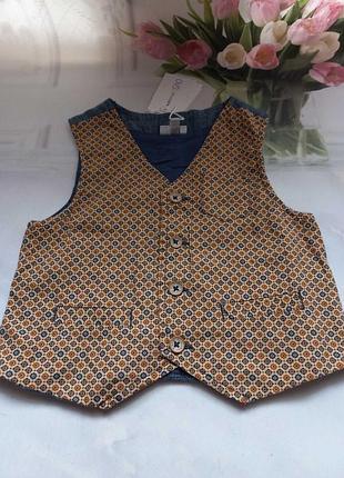 Жилеточка жилет