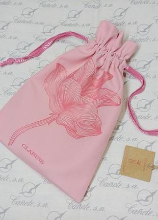 Розовый подарочный косметический мешочек с завязками clarins