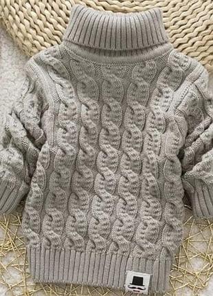 Дитячий вязаний світер з горловиною.
