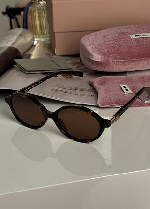 Очки smu04z vau-02n leo/brown miu  bk миу-миу