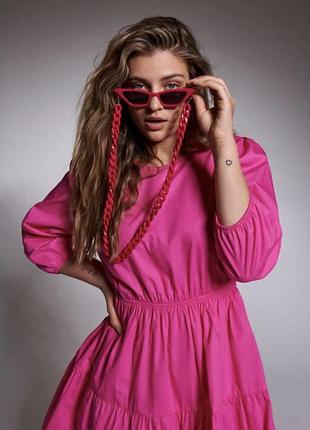 Рожева сукня з бантом на спині