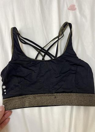 Чорний топ з золотими вставками