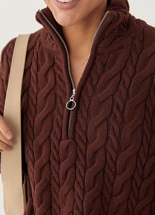 Светр із косичками