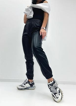 Жіночі теплі шкіряні штани на флісі