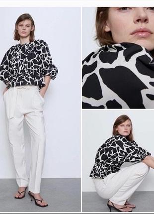 Блузка з v-подібним вирізом, анімастичний принт