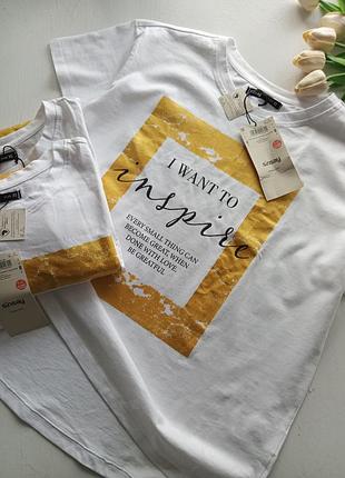 Фирменная футболка