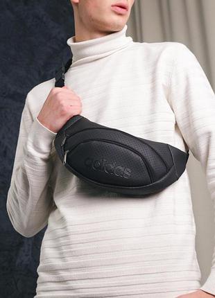 Бананка из перфор. кожзаменителя черная adidas (2334260555) s-ma