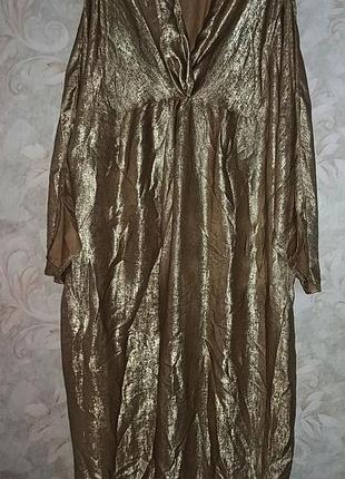 Золотиста туніка в східному стилі.