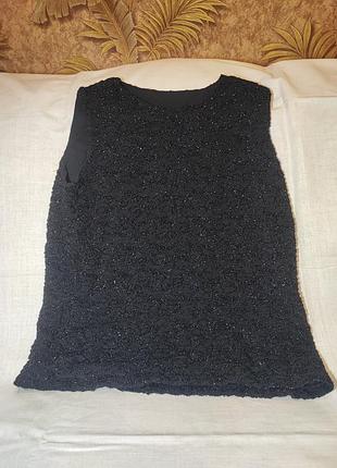 Ткань приятная к телу и немного тянется. 
размер: m
цвет: черный с легким блеском
производство: франция
состояние: отличное