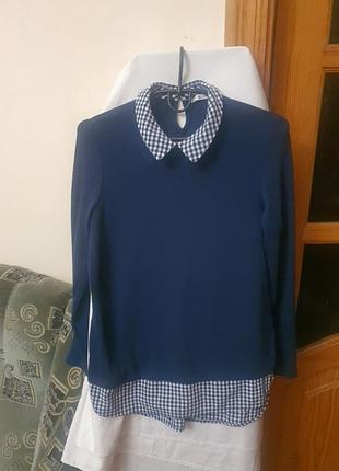 Блуза женская хорошего состава в идеальном состоянии, очень стильная, синяя, мягкий трикотаж,38см в плечах,68см длинна (взад трохих длинны), по груди 50см( полу)