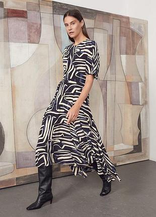 Брендова спідниця з розрізами в абстрактний принт jigsaw