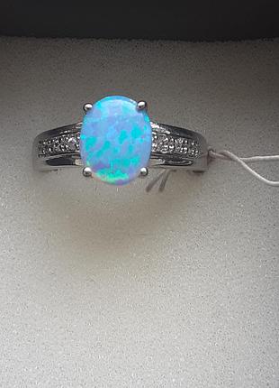 Каблочка с голубым опалом