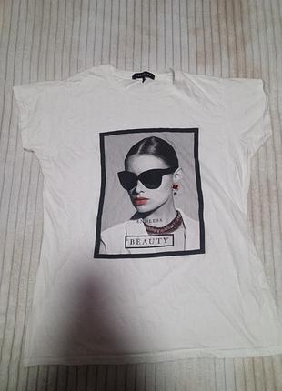 Футболка жіноча в хорошому стані.