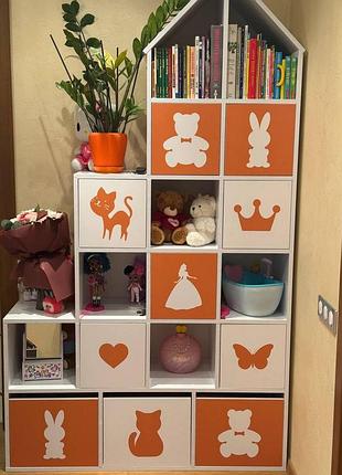 Стеллажи для детских игрушек домик 10 ящиков 17 ячеек цвет бело и оранжевый