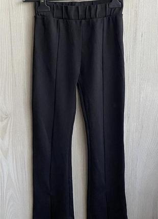 Брюки 11-12 років кльош