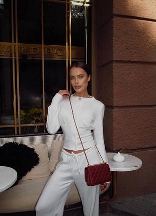 Жіночий тепленький костюм двійка приталена кофтинка і штани палаццо молочний