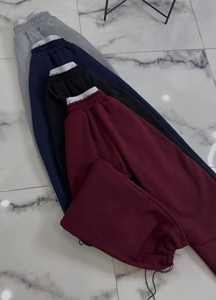 Жіночі теплі штани оверсайз палаццо з лого резинкою на талії, знизу на затяжках на флісі чорний, бордо, синій, сірий