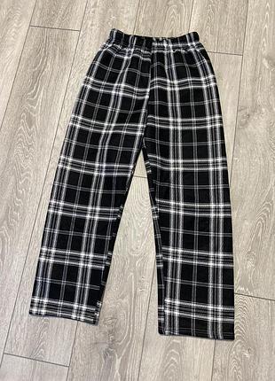 Теплі штани в клітинку на флісі