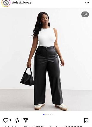 Крамиві чорні широкі брюки із еко шкіри батал