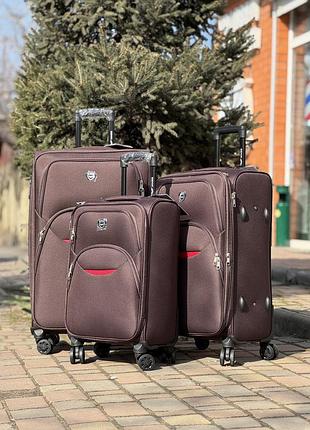 Средний чемодан дорожный тканевый m польша на колесах wings с подшипником