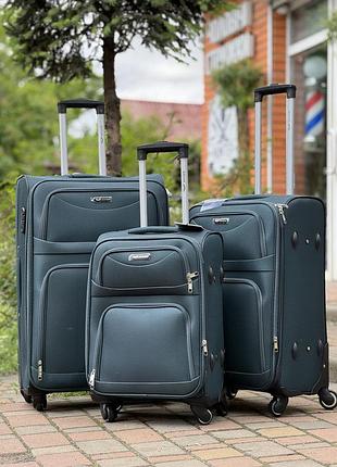 Большой чемодан дорожный тканевый l польша на колесах wings с подшипником