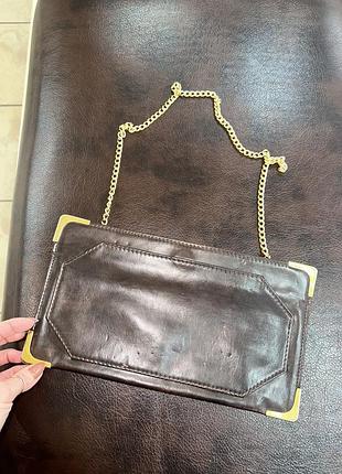 Грузовой кожаный клатч с золотистой фурнитурой