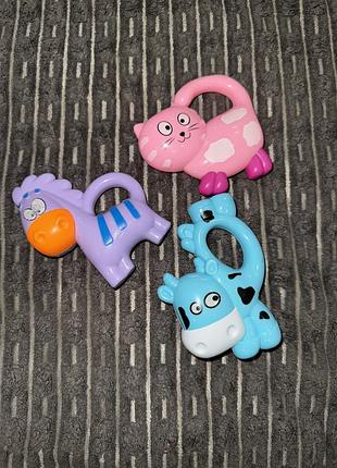 Брязкальця для немовлят, брязкальця в ручку