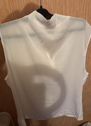 Блуза прозора,без рукавів,білого кольору!