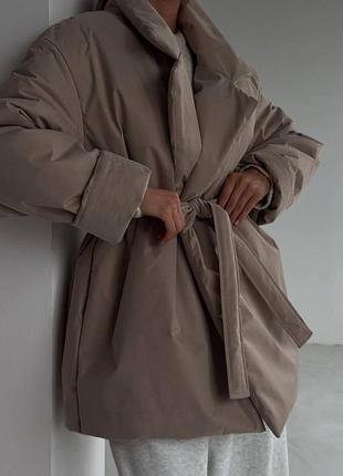 Зимова куртка з поясом