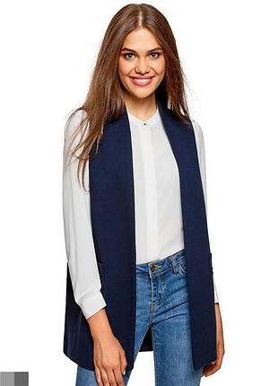 Женская жилетка трикотажная удлиненная