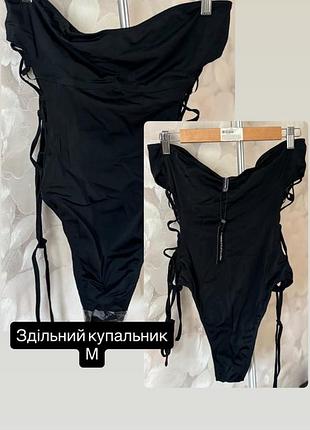 Жіночий чорний суцільний купальник
