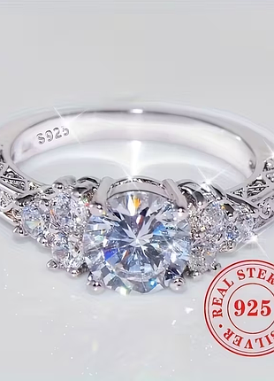 Кольцо из серебра 925 пробы  с драгоценными камнями