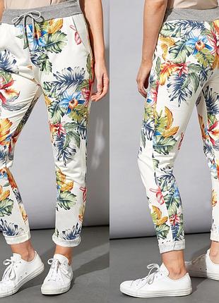 Нові без навісної бірки прогулянкові штани в квітковий принт