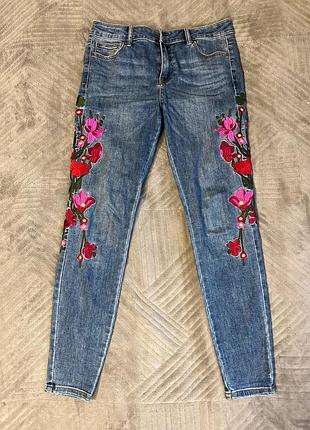 Джинси з принтом квітів