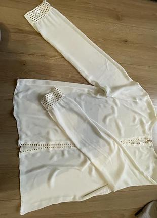 Блузка біла