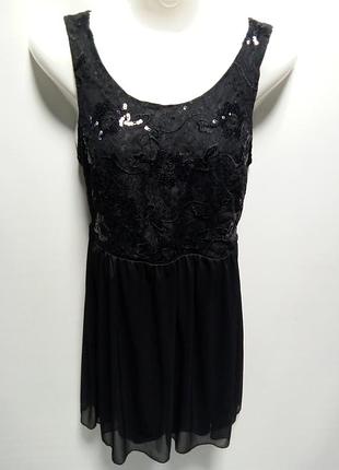 Сукня.
пайетки.
черный цвет