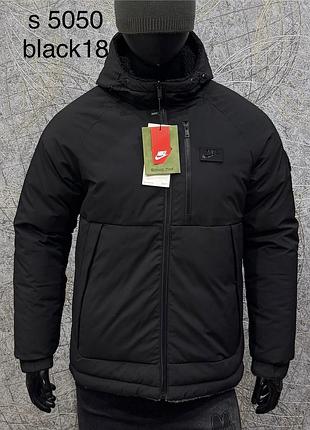 Двостороння зимова куртка