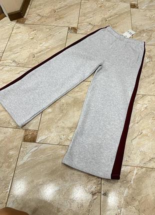 Штани палаццо флісові світло сірі з лампасами